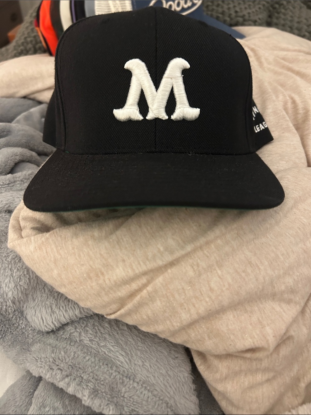 Black Hat with White 'M' Logo - Men's Baseball Cap